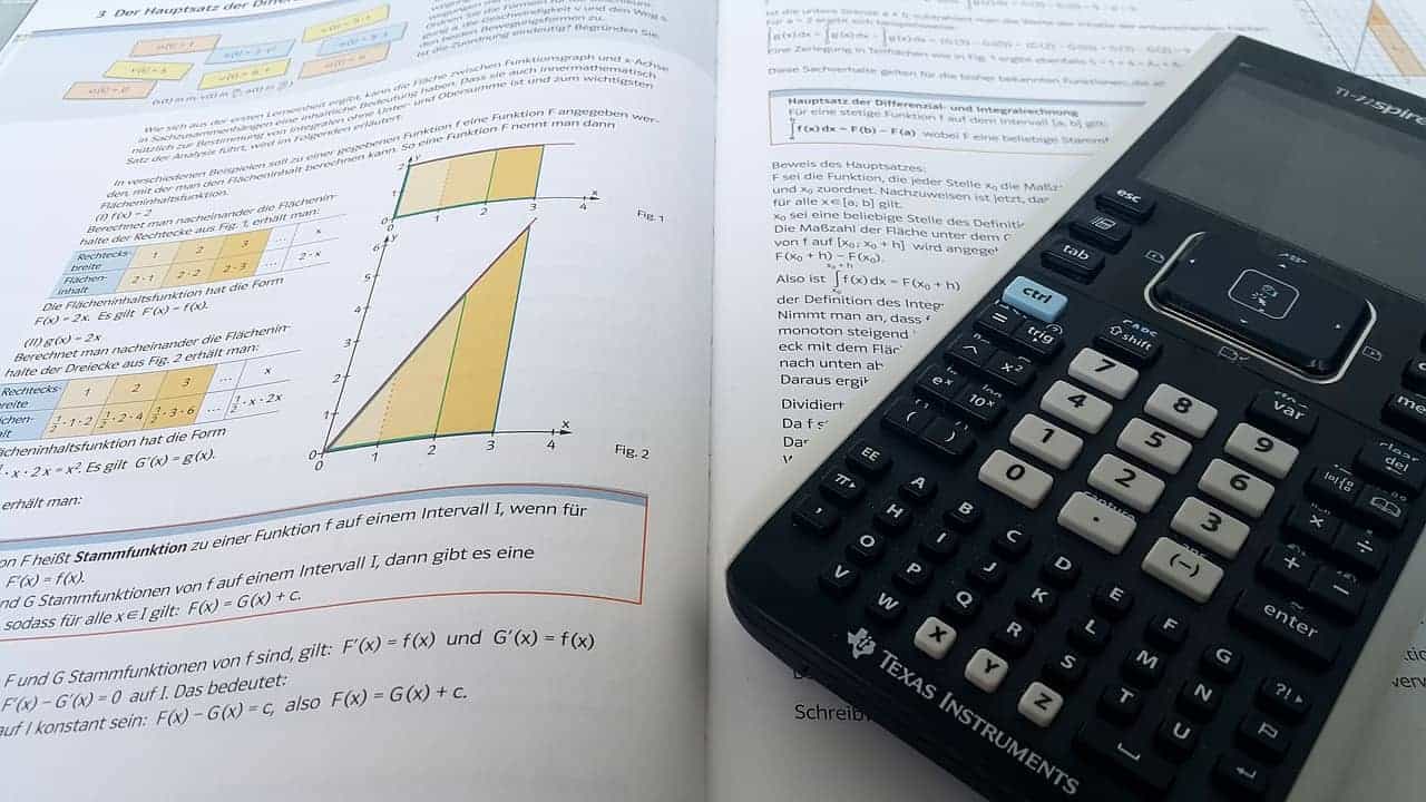 A-level mathematics textbook and calculator